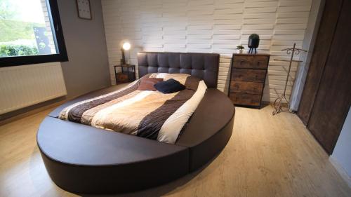 Säng eller sängar i ett rum på Chambre d'hôtes "Sur la route des Terrils"