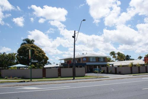a house on the side of a street at Rover Motel in Mackay