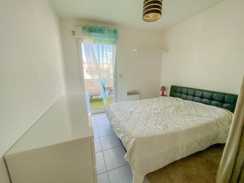 Postel nebo postele na pokoji v ubytování SUPERBE APPARTEMENT 47 m2, TRES CALME