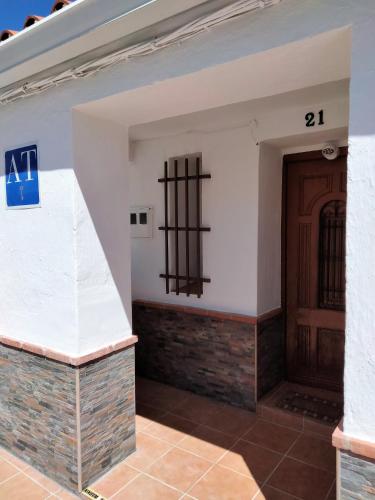 a view of the entrance to a building with a door at Apartamento Ceclavín in Cáceres