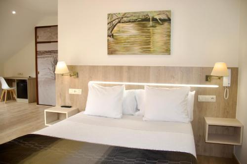 Katil atau katil-katil dalam bilik di Hotel Playa de Lago