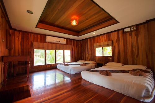 Katil atau katil-katil dalam bilik di Blue Diamond Resort