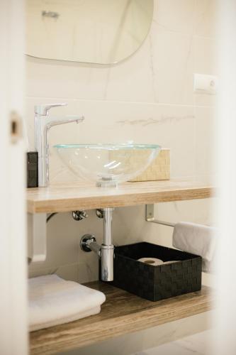 a bathroom with a sink on a counter at Dalex in Salou