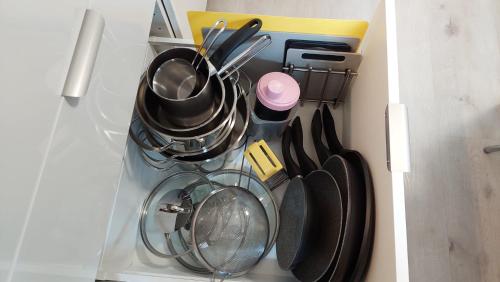 a drawer filled with utensils and utensils sidx sidx sidx at Apartma Marjetica in Gozd Martuljek