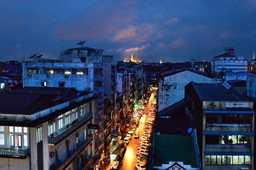 a view of a city at night at Hotel Grand United - Chinatown in Yangon
