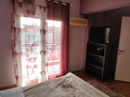 Katil atau katil-katil dalam bilik di My home in Komotini