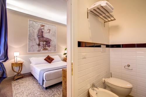 Posteľ alebo postele v izbe v ubytovaní Roma In Una Stanza Guesthouse
