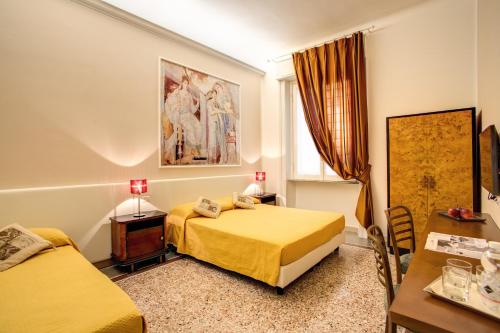 Roma In Una Stanza Guesthouseにあるベッド