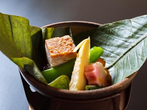 a bowl filled with different types of food at Shirayunoyado Yamadaya Hakone Gora in Hakone