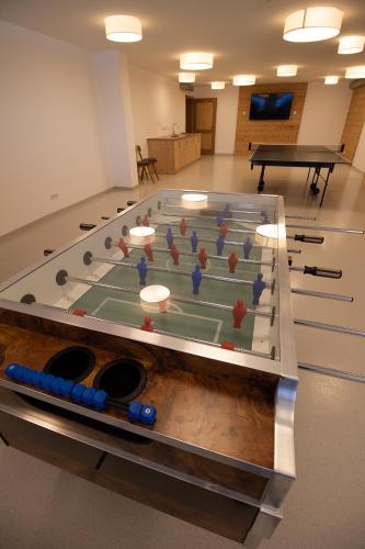 a large room with a large table with at Pension Tannenhof in Leogang