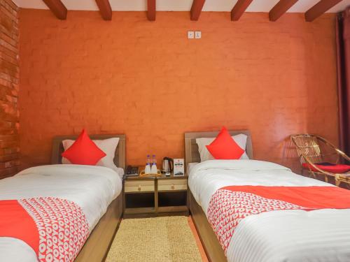 Uma cama ou camas num quarto em Kathmandu Cottage - Boutique