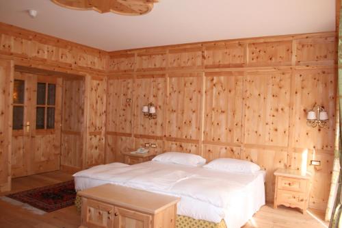 Postel nebo postele na pokoji v ubytování Hotel Lorenzetti