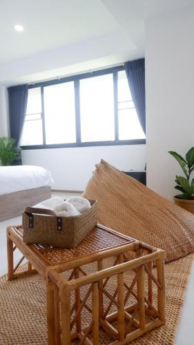 Postel nebo postele na pokoji v ubytování Darin Chiangmai Hotel and Residence