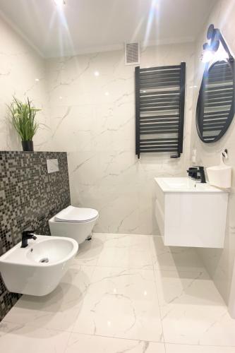 Ένα μπάνιο στο Apartament Solaris