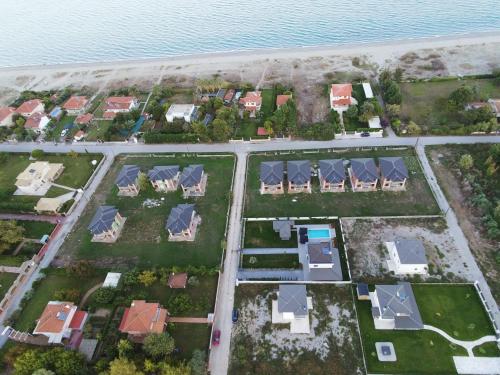 an aerial view of a house with a yard at Luxury Villa Plaka Litochorou with Pool in Plaka Litochorou