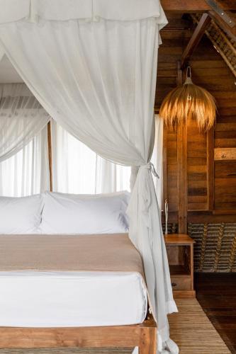 Postel nebo postele na pokoji v ubytování Tigerlillys Boutique Hotel