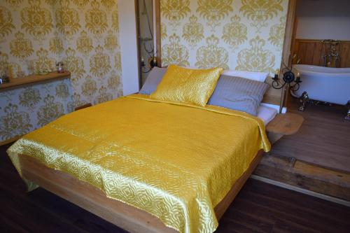 Postel nebo postele na pokoji v ubytování Le Chêne d’Or