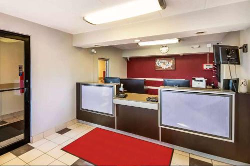a waiting area of a fast food restaurant with a counter at Days Inn by Wyndham Charleston WV in Charleston