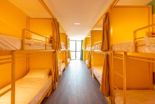 Ένα ή περισσότερα κρεβάτια σε δωμάτιο στο Hostelle - Women only hostel Barcelona