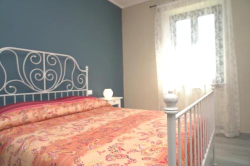 Postel nebo postele na pokoji v ubytování Cascina Riva