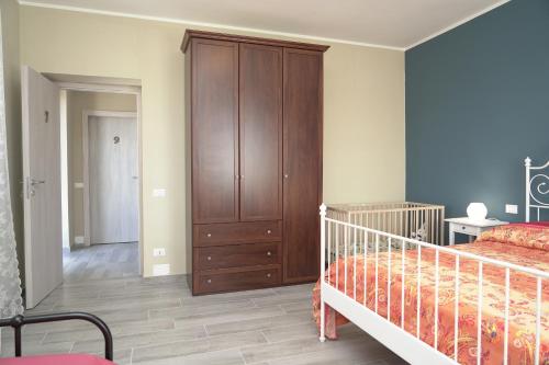 Postel nebo postele na pokoji v ubytování Cascina Riva