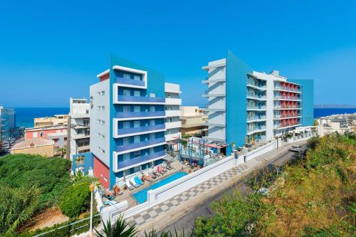 a view of a city with tall buildings at Semiramis City Hotel in Rhodes Town