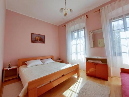 Ένα ή περισσότερα κρεβάτια σε δωμάτιο στο Rooms Nada