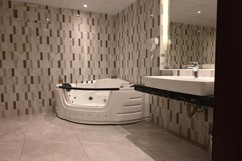 Koupelna v ubytování Quiet Dreams - Serviced Apartments King abdul Aziz Street Branch