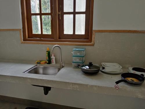 Η κουζίνα ή μικρή κουζίνα στο Thalduwa pavilion