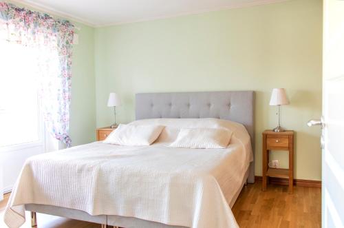 Кровать или кровати в номере Villa Timmernabben