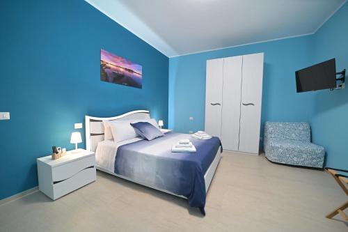 Кровать или кровати в номере Villa Borgo dei Pescatori