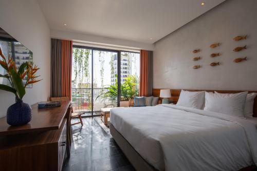 Katil atau katil-katil dalam bilik di Le Mint Hotel Quy Nhơn