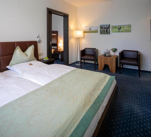 Katil atau katil-katil dalam bilik di Hotel Landhaus Pollmeyer