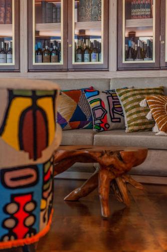 a couch with pillows on it in a room at Montargil Monte Novo in Montargil