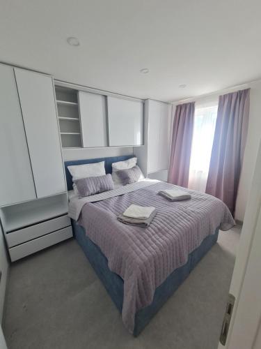 Posteľ alebo postele v izbe v ubytovaní Holiday Apartment Marijana