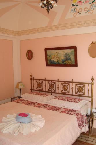 En eller flere senge i et værelse på B&B Masseria SD di Manchisi