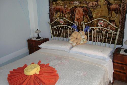 En eller flere senge i et værelse på B&B Masseria SD di Manchisi