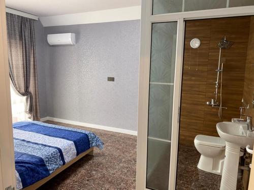 Kylpyhuone majoituspaikassa Caspian Villa Merdekan