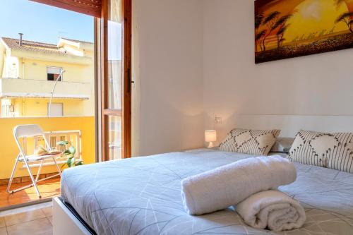 Postel nebo postele na pokoji v ubytování Sardinia rooms