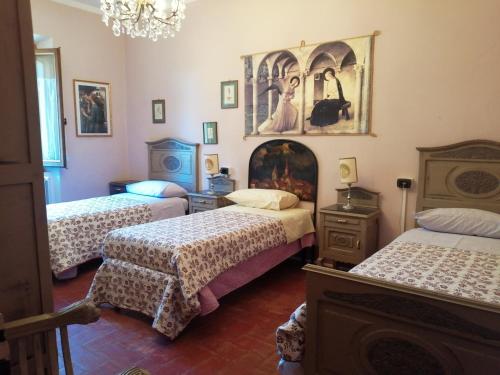 A bed or beds in a room at Campo alle Monache