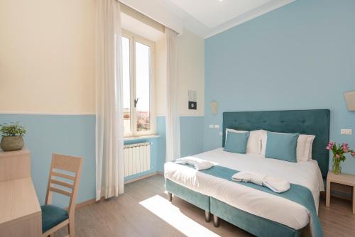 Postel nebo postele na pokoji v ubytování Hotel Parker - Gruppo BLAM HOTELS