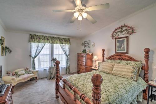 a bedroom with a bed and a ceiling fan at Oakland Retreat about 13 Mi to Deep Creek Lake! in Oakland