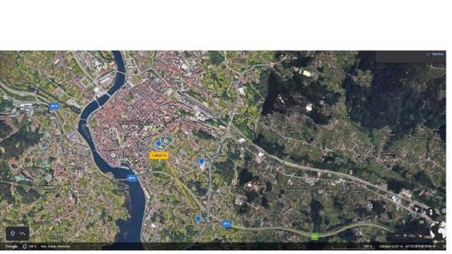 a map of a city with a road and a river at CASA VEIGA in Pontevedra