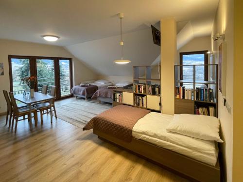 Posteľ alebo postele v izbe v ubytovaní Beskid Rose & SPA