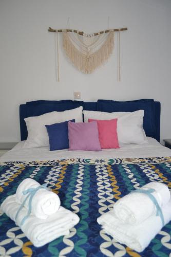 Postel nebo postele na pokoji v ubytování Evaliana Seaside Apartment