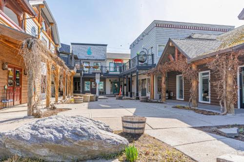an empty street in a town with buildings at The Electric Bungalow in Bigfork