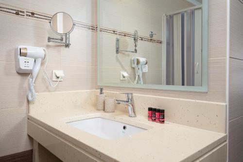 Koupelna v ubytování Minos Boutique Hotel