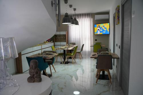 a living room with a teddy bear sitting on a table at B&B Angelo e Silvana in Licata