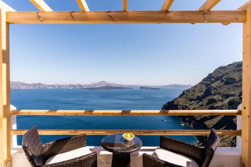 a room with a view of the ocean at Evanthia Best View Thirassia Island Hotel in Therasia