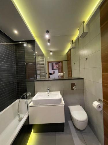 Kúpeľňa v ubytovaní ESEN Apartamenty Krakowska